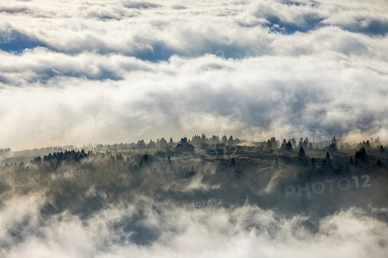 Aerial view, clouds over the Kahler Asten, Astenturm and hotel-restaurant, second highest mountain in North Rhine-Westphalia, Kahler Asten, 842 m high mountain with heathland as well as observation tower and restaurant on the summit, Winterberg, Sauerland, North Rhine-Westphalia, Germany