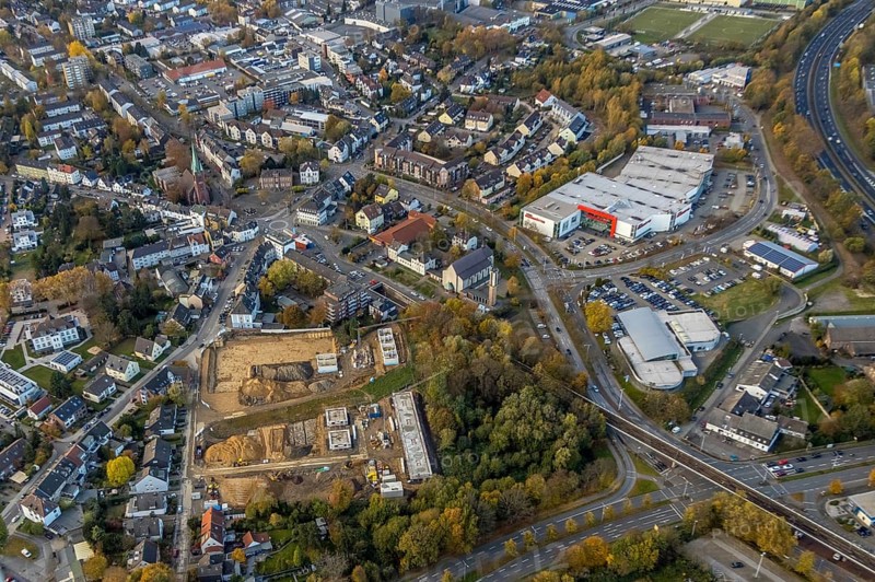 Aerial view, construction site of former football pitch, new construction of detached houses, St. Joseph Church, Heißen - Mitte, Mülheim an der Ruhr, Ruhr area, North Rhine-Westphalia, Germany, place of worship, construction work, construction area, construction site, building plots, construction project, DE, Europe, religious community, place of worship, holy place, Heißen Church, Hingbergstraße, church, parish, denomination, aerial view, aerial photography, aerial photography, new building, religion, religious site, overview, bird's-eye view, bird's-eye view, overview