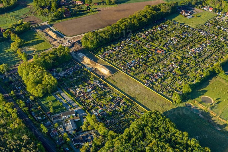 Aerial view, new bridge construction, expansion of federal road B51, new construction of federal road B481n, south-east bypass, allotment garden association Friedland, allotment garden association Erdenglück, Münster, Münsterland, North Rhine-Westphalia, Germany, construction work, construction area, construction site, construction measure, construction project, construction site, DE, Europe, community garden, KGV, canal, allotment garden, allotment garden association, aerial view, aerial photography, aerial photography, new building, allotment garden, road traffic, overview, traffic volume, bird's eye view, birds-eyes view, overview