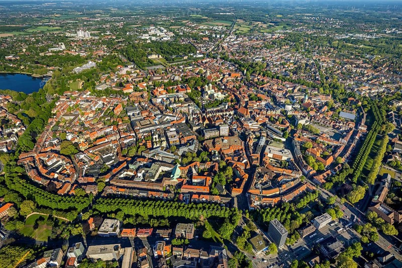 Aerial view, Old Town, Promenadenring, St Paul's Cathedral, Cathedral SquarePaulus-Dom, Domplatz, catholic Liebfrauen-Überwasserkirche, catholic St. Lamberti-Kirche, St. Martini-Kirche, Theater Münster, Münster, Münsterland, North Rhine-Westphalia, Germany, place of worship, DE, Europe, distant view, religious community, house of worship, property tax, real estate, church, church community, denomination, culture, art, aerial view, aerial photography, aerial photography, religion, theatre, overview, events, bird's eye view, residential area, living and working, living and life, residential area, residential buildings, housing estate, birds-eyes view, historic city centre, historic city centre, overview