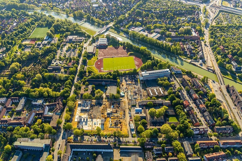 Aerial view, construction site, new Mathilde-Anneke comprehensive school, sports field, sports club Münster 08, Dortmund-Ems canal, Münster, Münsterland, North Rhine-Westphalia, Germany, Albert-Schweitzer-Schule Münster, construction, construction area, building site, building plots, construction project, construction site, education, educational institution, DE, Europe, football pitch, football stadium, football club, comprehensive school, Hans-Böckler-Berufskolleg, canal, educational institute, aerial view, aerial photography, aerial photography, new building, school, sports, sports facilities, sports field, sports facility, overview, bird's-eye view, birds-eyes view, overview