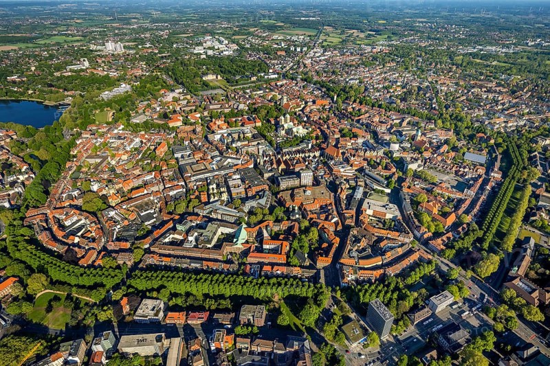 Aerial view, Old Town, Promenadenring, St Paul's Cathedral, Cathedral SquarePaulus-Dom, Domplatz, catholic Liebfrauen-Überwasserkirche, catholic St. Lamberti-Kirche, St. Martini-Kirche, Theater Münster, Münster, Münsterland, North Rhine-Westphalia, Germany, place of worship, DE, Europe, distant view, religious community, house of worship, property tax, real estate, church, church community, denomination, culture, art, aerial view, aerial photography, aerial photography, religion, theatre, overview, events, bird's eye view, residential area, living and working, living and life, residential area, residential buildings, housing estate, birds-eyes view, historic city centre, historic city centre, overview