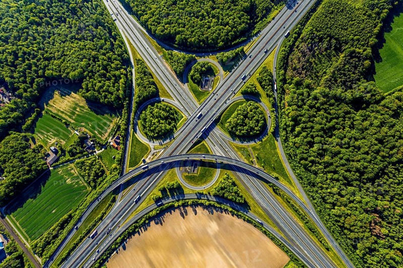 Aerial view, motorway junction Münster-Süd, motorway A1, motorway A43, Münster, Münsterland, North Rhine-Westphalia, Germany, motorway, motorway bridge, motorway junction, greening, DE, Europe, shapes and colours, freight traffic, landscape forms, aerial view, aerial photography, aerial photography, road traffic, overview, traffic, traffic volume, bird's-eye view, forest area, meadows and fields, birds-eyes view, overview