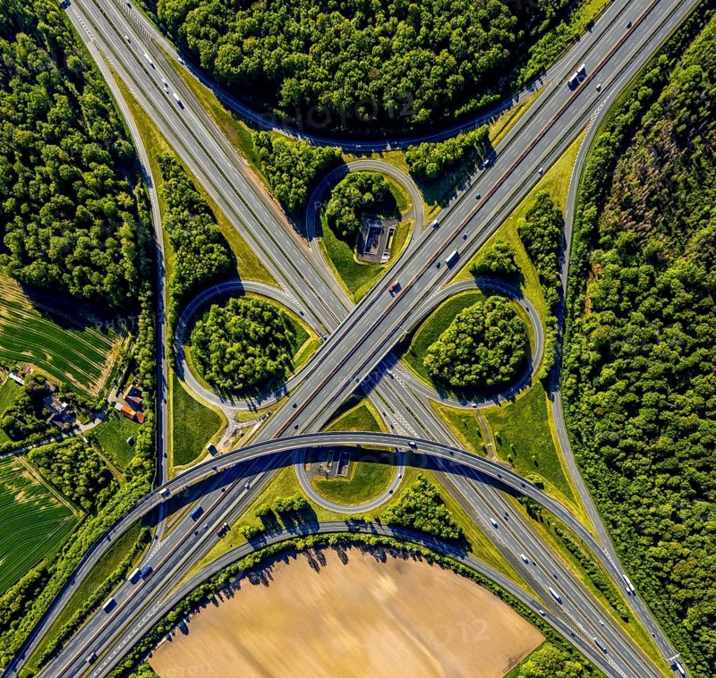 Aerial view, motorway junction Münster-Süd, motorway A1, motorway A43, Münster, Münsterland, North Rhine-Westphalia, Germany, motorway, motorway bridge, motorway junction, greening, DE, Europe, shapes and colours, freight traffic, landscape forms, aerial view, aerial photography, aerial photography, road traffic, overview, traffic, traffic volume, bird's-eye view, forest area, meadows and fields, birds-eyes view, overview