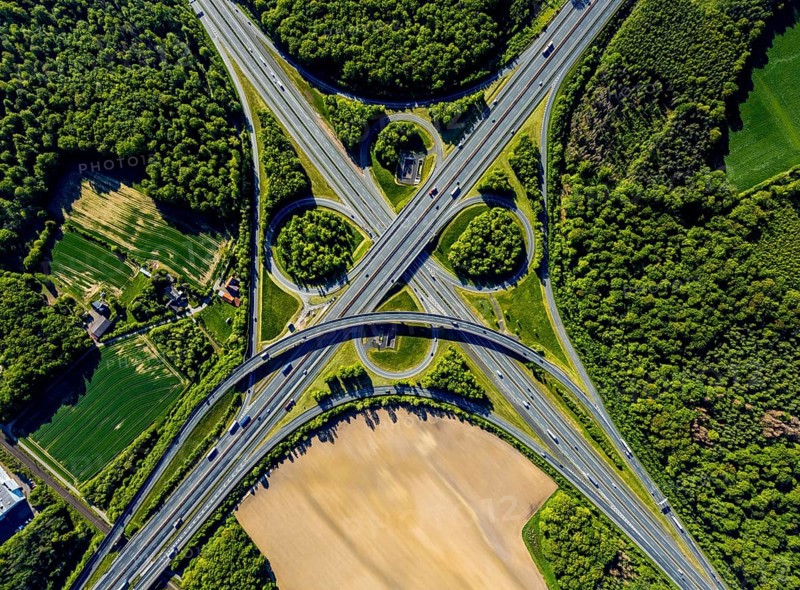 Aerial view, motorway junction Münster-Süd, motorway A1, motorway A43, Münster, Münsterland, North Rhine-Westphalia, Germany, motorway, motorway bridge, motorway junction, greening, DE, Europe, shapes and colours, freight traffic, landscape forms, aerial view, aerial photography, aerial photography, road traffic, overview, traffic, traffic volume, bird's-eye view, forest area, meadows and fields, birds-eyes view, overview