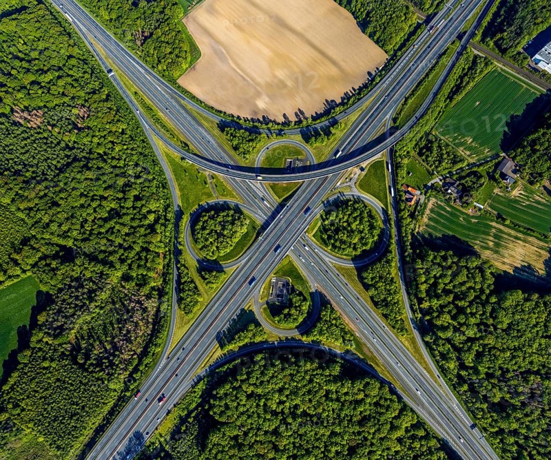 Aerial view, motorway junction Münster-Süd, motorway A1, motorway A43, Münster, Münsterland, North Rhine-Westphalia, Germany, motorway, motorway bridge, motorway junction, greening, DE, Europe, shapes and colours, freight traffic, landscape forms, aerial view, aerial photography, aerial photography, road traffic, overview, traffic, traffic volume, bird's-eye view, forest area, meadows and fields, birds-eyes view, overview