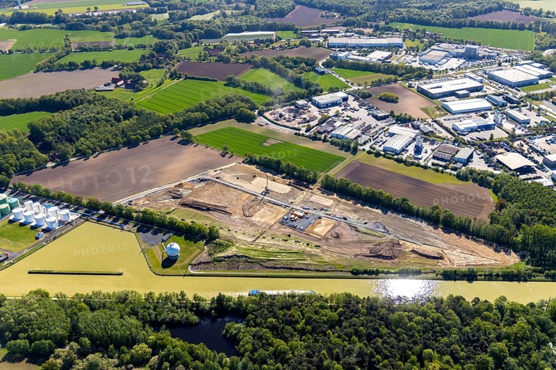 Aerial view, construction site at Westfalen Tanklager- und Transportgesellschaft, Dortmund-Ems-Kanal, industrial area Hessenweg, Münster, Münsterland, North Rhine-Westphalia, Germany, construction work, construction area, construction site, building plot, construction project, construction site, DE, Europe, commercial enterprises, commercial area, commercial area, commercial location, commercial use, industrial plants, industrial area, industrial location, aerial photograph, aerial photography, aerial photography, overview, bird's eye view, birds-eyes view, overview