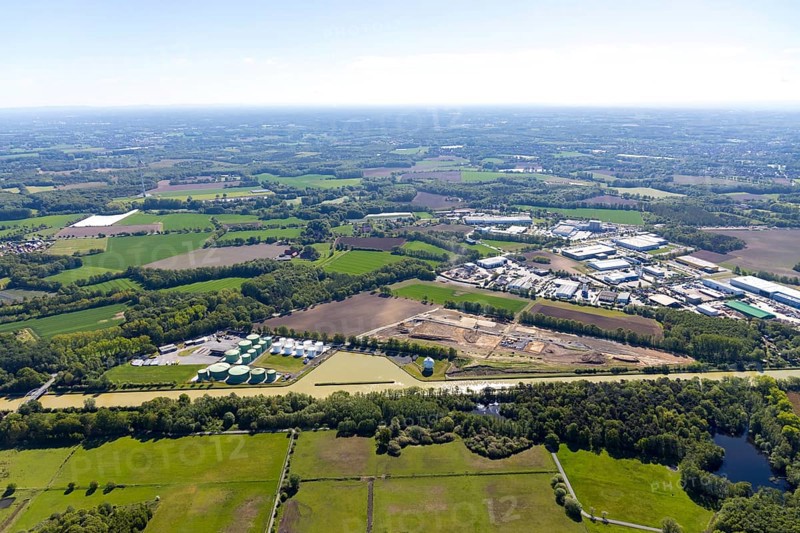 Aerial view, construction site at Westfalen Tanklager- und Transportgesellschaft, Dortmund-Ems-Kanal, Hessenweg industrial estate, Münster, Münsterland, North Rhine-Westphalia, Germany, construction work, construction area, construction site, building land, construction project, construction site, DE, Europe, commercial enterprises, commercial area, commercial site, commercial use, Hessenweg, industrial plants, industrial area, industrial site, aerial photograph, aerial photography, aerial photography, overview, bird's eye view, bird's eye view, overview