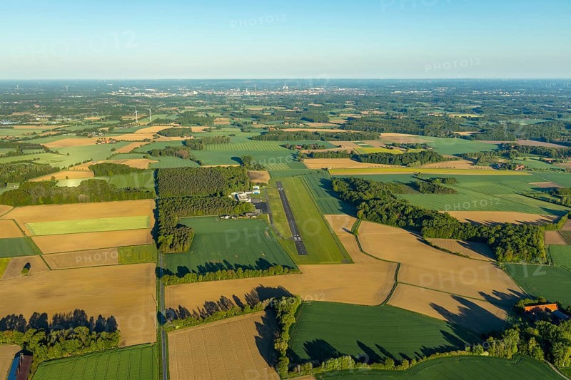 Aerial photo, Münster-Telgte airfield, Telgte, Warendorf district, Münsterland, North Rhine-Westphalia, Germany, DE, Europe, distant view, airport, FunFlight flight school, runway, aerial photo, aerial photography, aerial photography, runway, overview, bird's-eye view, woodland, meadows and fields, birds-eyes view, overview