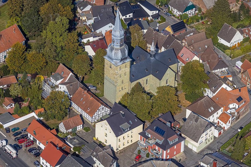 Aerial view, town view, St. Stephanus Kirche, Oestinghausen, Lippetal, Kreis Soest, North Rhine-Westphalia, Germany, place of worship, DE, Europe, religious community, place of worship, property tax, real estate, city centre, church, parish, denomination, Kreis-Soest-Buch, KreisSoestBuch, aerial view, aerial photography, aerial photography, religion, city centre, overview, bird's-eye view, residential area, living and life, residential area, residential buildings, quality of life, residential quarter, housing estate, birds-eyes view, overview