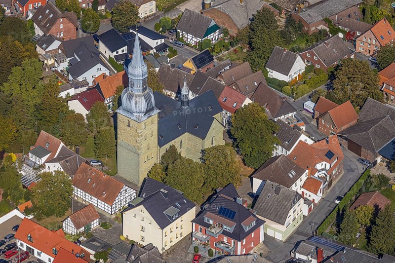 Aerial view, town view, St. Stephanus Kirche, Oestinghausen, Lippetal, Kreis Soest, North Rhine-Westphalia, Germany, place of worship, DE, Europe, religious community, place of worship, property tax, real estate, city centre, church, parish, denomination, Kreis-Soest-Buch, KreisSoestBuch, aerial view, aerial photography, aerial photography, religion, city centre, overview, bird's-eye view, residential area, living and life, residential area, residential buildings, quality of life, residential quarter, housing estate, birds-eyes view, overview