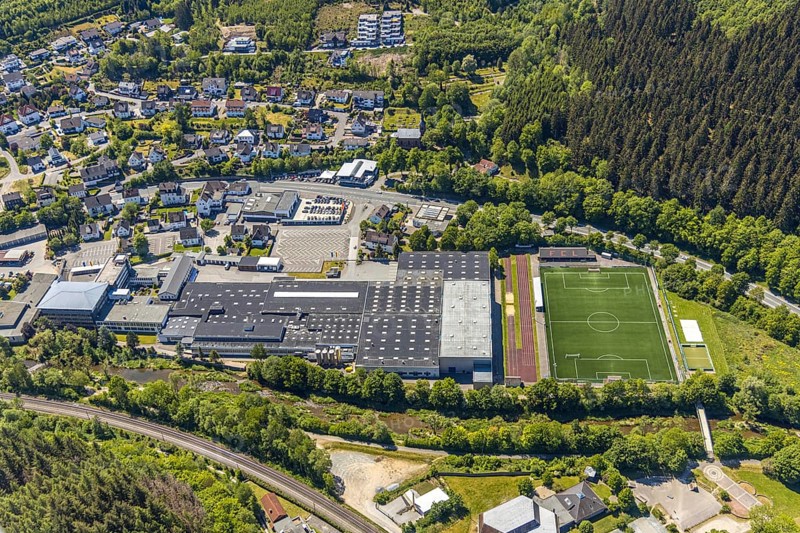 Aerial photo, Hensel Werk, sports field FC Lennestadt, Meggen, Lennestadt, Sauerland, North Rhine-Westphalia, Germany, DE, Europe, football pitch, football stadium, football club, commercial enterprises, commercial area, commercial area, commercial site, commercial use, industrial area, industrial site, aerial photograph, aerial photography, aerial photography, sports, sports facilities, sports field, sports facility, overview, bird's-eye view, overview