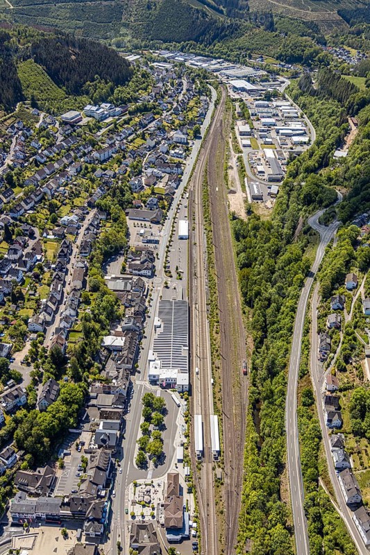 Aerial view, Lennestadt-Altenhundem railway station, Hundem Lenne Center, commercial area railway depot, Altenhundem, Lennestadt, Sauerland, North Rhine-Westphalia, Germany, railway tracks, railway station, station forecourt, DE, Deutsche Bahn AG, Europe, commercial enterprises, commercial area, commercial area, commercial location, commercial use, industrial area, industrial location, aerial view, aerial photography, aerial photography, overview, bird's eye view, birds-eyes view, overview