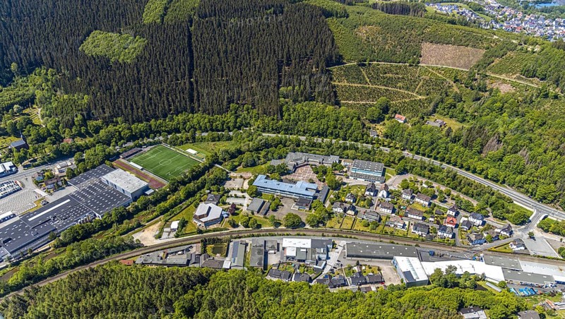 Aerial view, secondary school Hundem-Lenne, St. Barbara-Schule Meggen, theatre of the city of Lennestadt, Anne-Frank-Platz, Meggen, Lennestadt, Sauerland, North Rhine-Westphalia, Germany, education, educational institution, DE, Europe, FC Lennestadt e.V. sports club, culture, art, teaching institute, Lenne Therme GmbH, aerial view, aerial photography, aerial photography, drama, school, sports field, theatre, overview, events, event location, bird's eye view, birds-eyes view, cultural use, overview