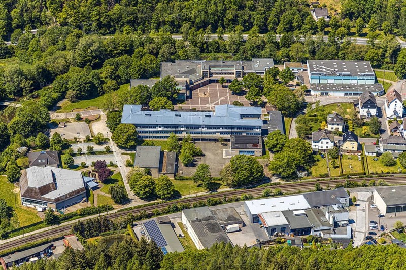 Aerial view, secondary school Hundem-Lenne, St. Barbara-Schule Meggen, theatre of the city of Lennestadt, Anne-Frank-Platz, Meggen, Lennestadt, Sauerland, North Rhine-Westphalia, Germany, education, educational institution, DE, Europe, culture, art, teaching institute, Lenne Therme GmbH, aerial photograph, aerial photography, aerial photography, drama, school, theatre, overview, events, event location, bird's eye view, birds-eyes view, cultural use, overview