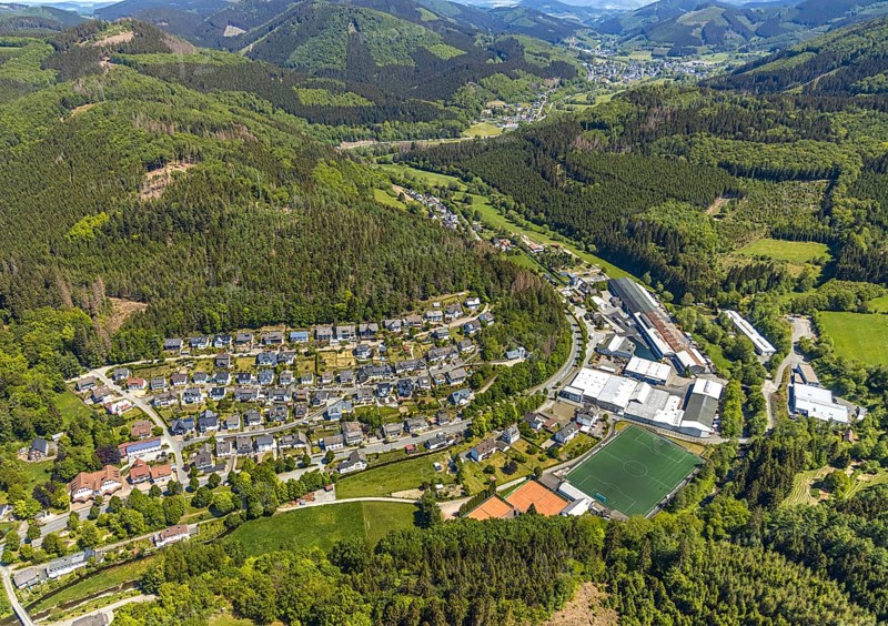 Aerial view, Langenei sports field, Fredeburger Straße commercial area, Langenei town view, Lennestadt, Sauerland, North Rhine-Westphalia, Germany, DE, Europe, Fredeburger Straße, football pitch, football stadium, property tax, hilly landscape, real estate, aerial view, aerial photography, aerial photography, sports, sports facilities, sports field, sports facility, tennis, tennis facility, tennis courts, overview, bird's-eye view, forest area, residential area, housing and living, residential area, residential buildings, housing estate, birds-eyes view, overview