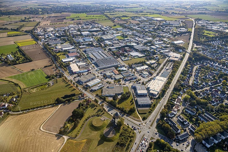 Aerial view, industrial estate Am Wasserturm, Bökenförder Straße, Lippstadt, district of Soest, North Rhine-Westphalia, Germany, Berliner Straße, federal road B55, Columna infinita, DE, monument protection, Europe, distant view, commercial enterprises, commercial area, commercial park, commercial site, commercial use, industrial monument, industrial area, industrial building, industrial site, Kreis-Soest-Buch, KreisSoestBuch, art object, aerial photograph, aerial photography, aerial photography, sight, overview, bird's-eye view, landmark, water tower Lippstadt, meadows and fields, birds-eyes view, overview