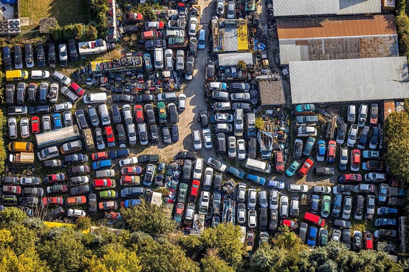 Aerial photograph, Böhmer garage, scrap yard, Herringhausen, Lippstadt, Soest district, North Rhine-Westphalia, Germany, DE, Europe, shapes and colours, Kreis-Soest-Buch, KreisSoestBuch, aerial photograph, aerial photography, aerial photography, recycling, overview, recycling, bird's-eye view, overview