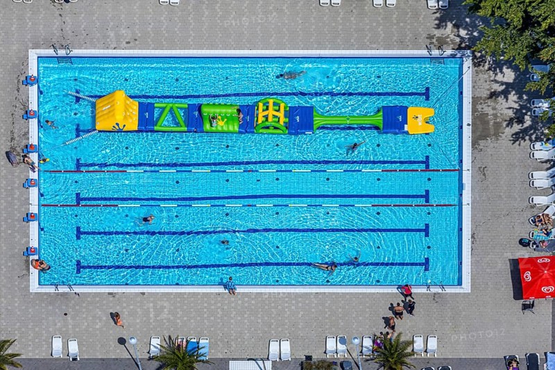 Aerial view, adventure pool, Aqua Spa and Aqua Fun Soest, outdoor pool, bathers, Soest, Soester Börde, North Rhine-Westphalia, Germany, DE, Europe, birds-eyes view, aerial view, aerial photography, aerial photography, overview, overview, bird's eye view, corona distance, keeping distance, swimming pool with Suan, sauna park, swimming pool, swimmer, blue water, sunbathing lawn, parasols