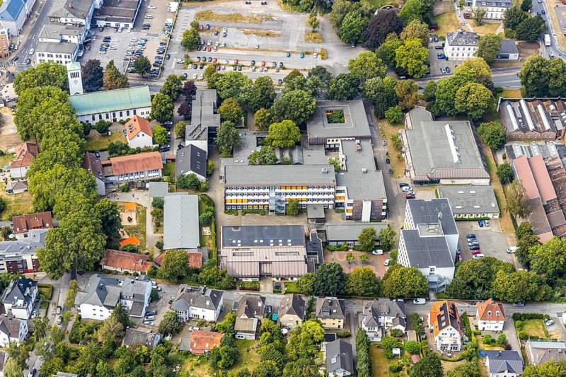 Aerial view, Hönne Berufskolleg, Kreissporthalle Menden, Kath. Kirche St. Walburgis, Menden, Sauerland, Märkischer Kreis, North Rhine-Westphalia, Germany, place of worship, vocational school, education, educational institution, DE, Europe, commercial area, religious community, church, parish, denomination, educational institute, aerial view, aerial photography, aerial photography, religion, school, sports, sports hall, overview, bird's-eye view, Werler Straße, birds-eyes view, overview