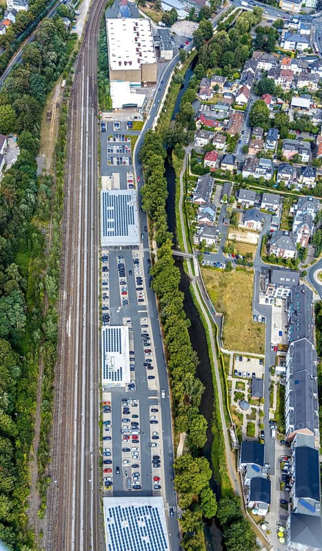 Aerial view, shopping centre Untere Promenade, Hönneinsel, Menden, Sauerland, Märkischer Kreis, North Rhine-Westphalia, Germany, Aldi supermarket, Bringhof Menden Recyclinghof, DE, shopping markets, shopping place, shopping centre, Europe, green trees, island, aerial view, aerial photography, aerial photography, local supply centre, overview, bird's-eye view, birds-eyes view, dm-drogerie markt, overview