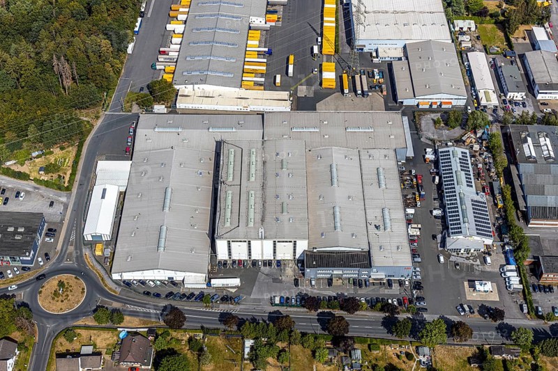 Aerial view, Meisenweg industrial estate, DHL Freight GmbH, Menden, Sauerland, Märkischer Kreis, North Rhine-Westphalia, Germany, DE, Europe, freight forwarding service, commercial enterprises, commercial area, commercial park, commercial location, commercial use, freight traffic, industrial area, industrial location, logistics, logistics service, logistics service provider, logistics provider, logistics centre, aerial photograph, aerial photography, aerial photography, freight forwarding, transport, transport service, overview, bird's eye view, birds-eyes view, overview