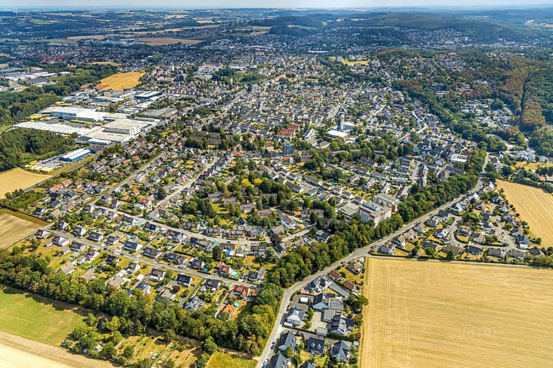 Aerial view, local view Platte Heide, meadows and fields, Menden, Sauerland, Märkischer Kreis, North Rhine-Westphalia, Germany, retirement home, old people's home, retirement home, place of worship, care and nursing, education, educational institution, Bonifatiusschule, DE, DHL Freight, Europe, freight forwarding service, Platte Heide Community Primary School, religious community, place of worship, freight transport, Jochen-Klepper-Haus, church, parish, denomination, educational institute, logistics, logistics service, logistics service provider, logistics provider, aerial photography, aerial photography, care facility, care home, religion, school, retirement home, retirement residence, retirement home, retirement centre, forwarding agency, sports hall Bonifatiusschule Platte Heide, transport, transport service, overview, bird's-eye view, birds-eyes view, cath. Church of St Mary, overview