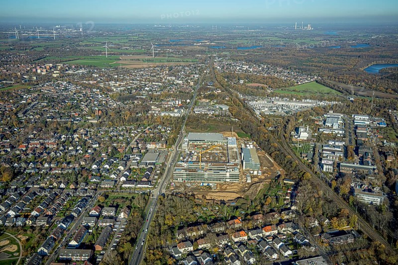 Aerial view, construction site, new Edeka headquarters, Rheinberger Straße, Rheinkamp-Utfort, Mörs, Ruhr area, North Rhine-Westphalia, Germany, construction work, construction, construction area, building site, building plots, construction project, construction site, DE, Edeka Markt, Europe, aerial view, aerial photography, aerial photography, new building, overview, administration, bird's eye view, birds-eyes view, overview