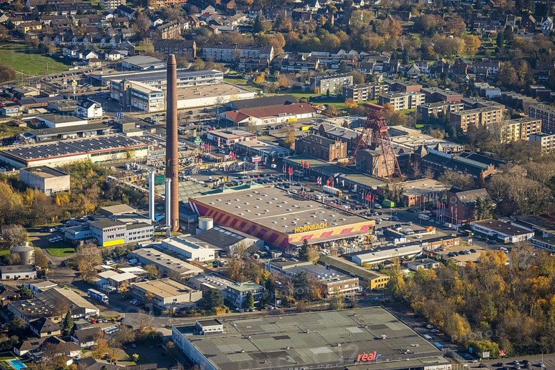 Aerial view, industrial area Rheinpreußenpark, former colliery Rheinpreußen, Moers-Hochstraß, Mörs, Ruhr area, North Rhine-Westphalia, Germany, DE, Europe, winding tower, commercial enterprises, commercial area, commercial park, commercial location, commercial use, Hornbach Baumarkt, industrial area, industrial building, industrial location, aerial photograph, aerial photography, aerial photography, tower, overview, bird's eye view, Zechenstraße, birds-eyes view, historical place, overview