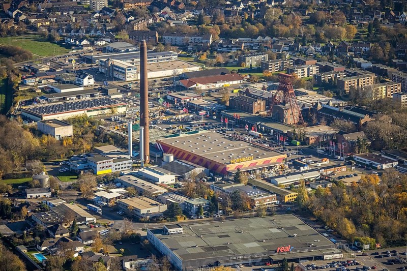 Aerial view, industrial area Rheinpreußenpark, former colliery Rheinpreußen, Moers-Hochstraß, Mörs, Ruhr area, North Rhine-Westphalia, Germany, DE, Europe, winding tower, commercial enterprises, commercial area, commercial park, commercial location, commercial use, Hornbach Baumarkt, industrial area, industrial building, industrial location, aerial photograph, aerial photography, aerial photography, tower, overview, bird's eye view, Zechenstraße, birds-eyes view, historical place, overview