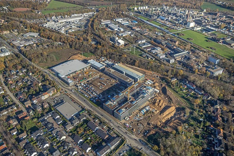 Aerial view, construction site, new Edeka headquarters, Rheinberger Straße, Rheinkamp-Utfort, Mörs, Ruhr area, North Rhine-Westphalia, Germany, construction work, construction, construction area, building site, building plots, construction project, construction site, DE, Edeka Markt, Europe, aerial view, aerial photography, aerial photography, new building, overview, administration, bird's eye view, birds-eyes view, overview