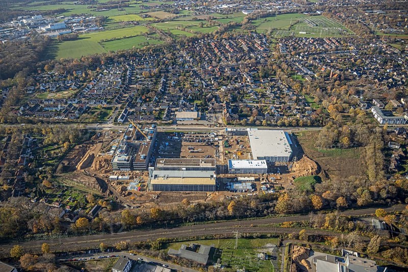 Aerial view, construction site, new Edeka headquarters, Rheinberger Straße, Rheinkamp-Utfort, Mörs, Ruhr area, North Rhine-Westphalia, Germany, construction work, construction, construction area, building site, building plots, construction project, construction site, DE, Edeka Markt, Europe, aerial view, aerial photography, aerial photography, new building, overview, administration, bird's eye view, birds-eyes view, overview