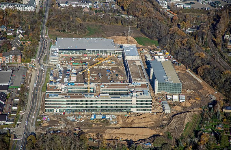 Aerial view, construction site, new Edeka headquarters, Rheinberger Straße, Rheinkamp-Utfort, Mörs, Ruhr area, North Rhine-Westphalia, Germany, construction work, construction, construction area, building site, building plots, construction project, construction site, DE, Edeka Markt, Europe, aerial view, aerial photography, aerial photography, new building, overview, administration, bird's eye view, birds-eyes view, overview