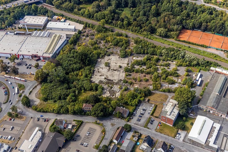 Aerial view, Evidal site, Carl-Benz-Straße construction area, Hellweg Baumarkt, Menden, Sauerland, Märkischer Kreis, North Rhine-Westphalia, Germany, railway tracks, construction area, construction site, building plots, construction project, construction site, DE, Europe, commercial enterprises, commercial area, commercial site, commercial use, industrial area, industrial site, aerial photograph, aerial photography, aerial photography, overview, bird's eye view, birds-eyes view, overview