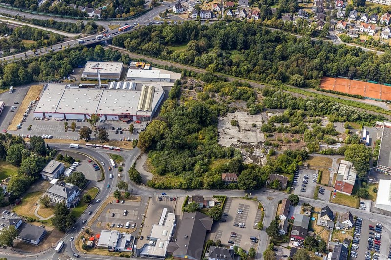 Aerial view, Evidal site, Carl-Benz-Straße construction area, Hellweg Baumarkt, Menden, Sauerland, Märkischer Kreis, North Rhine-Westphalia, Germany, railway tracks, construction area, construction site, building plots, construction project, construction site, DE, Europe, commercial enterprises, commercial area, commercial site, commercial use, industrial area, industrial site, aerial photograph, aerial photography, aerial photography, overview, bird's eye view, birds-eyes view, overview