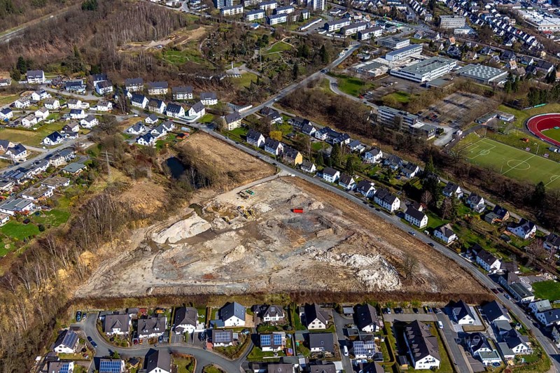 Aerial view, construction area residential development Waldstraße, former concrete plant Waldstraße, Meschede, Sauerland, North Rhine-Westphalia, Germany, construction work, construction vehicles, construction area, building site, building plots, construction measure, construction project, construction site, DE, development, Europe, property tax, real estate, capacity requirement, aerial photograph, aerial photography, aerial photography, overview, bird's eye view, residential complex, living and living, residential area, residential buildings, residential quality, residential neighbourhood, housing estate, birds-eyes view, overview
