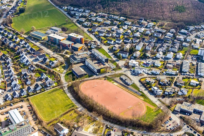 Aerial view, Gymnasium der Stadt Meschede, sports facilities, Löttmaringhausen, Meschede, Sauerland, North Rhine-Westphalia, Germany, education, educational institution, DE, Europe, football pitch, property tax, grammar school, real estate, educational institute, aerial photography, aerial photography, terraced houses, Schederweg, school, sports, sports field, sports facility, overview, bird's eye view, residential complex, residential area, residential buildings, residential quality, residential neighbourhood, housing estate, birds-eyes view, overview