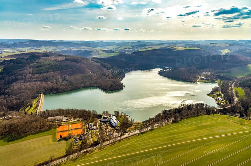Aerial view, Hennetalsperre, Hennesee, Welcome Hotel Meschede Hennesee, Meschede, Sauerland, North Rhine-Westphalia, Germany, DE, food and drink, Europe, distant view, shapes and colours, inn, gastronomy, Hennedamm, hotel, hotel facilities, hotel industry, hilly landscape, landscape panorama, aerial view, aerial photography, aerial photography, mixed forest, coniferous forest, sport, dam wall, reservoir, dam, tennis, tennis facility, tennis courts, overview, bird's-eye view, forest, forest area, forest dieback, Welcome Hotel Meschede/Hennesee, birds-eyes view, overview