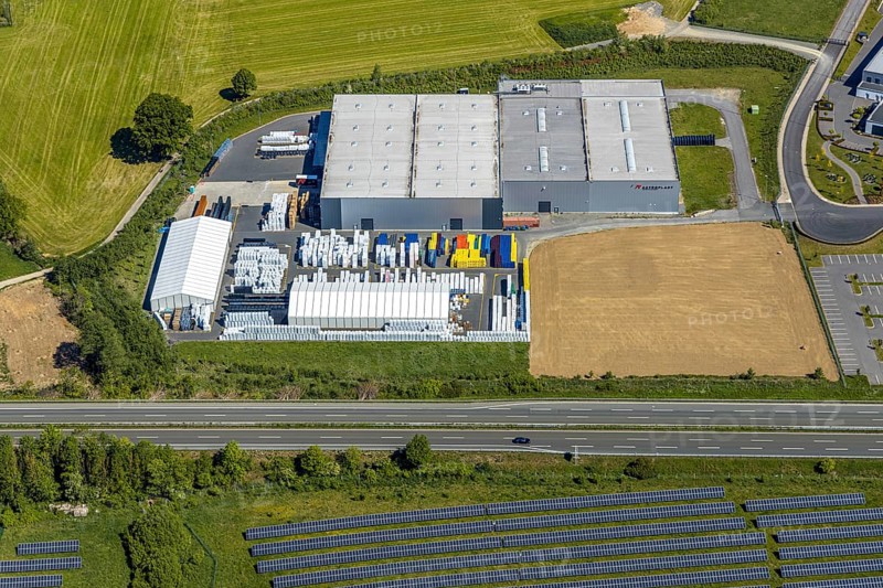 Aerial view, industrial park Enste Nord, Meschede, Sauerland, North Rhine-Westphalia, Germany, motorway A46, motorway junction Enste, DE, Europe, commercial enterprises, commercial area, commercial park, commercial location, commercial use, Hochsauerlandkreis, industrial area, industrial location, aerial view, aerial photography, aerial photography, solar park Enste, overview, bird's-eye view, bird's-eye view, overview
