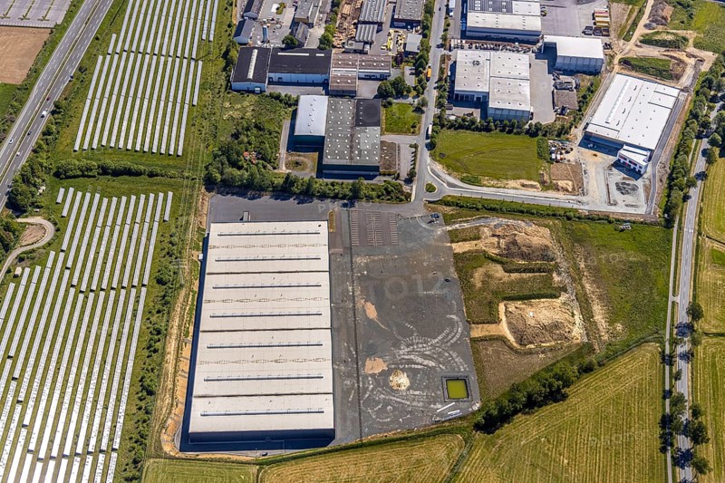 Aerial view, industrial estate Enste Nord, new building logistics centre Briloner Leuchten GmbH, Meschede, Sauerland, North Rhine-Westphalia, Germany, motorway A46, motorway junction Enste, DE, Europe, commercial enterprises, commercial area, industrial estate, commercial park, commercial location, commercial use, Hochsauerlandkreis, industrial area, industrial location, aerial view, aerial photography, aerial photography, solar park Enste, overview, bird's-eye view, overview