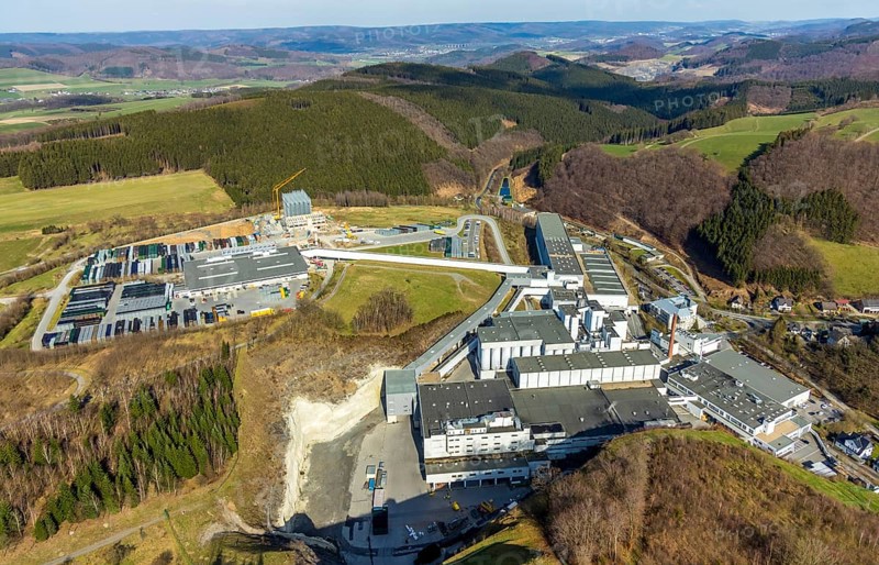 Aerial view, Brewery C.& A. VELTINS GmbH & Co. KG, new high-bay warehouse, Grevenstein, Meschede, Sauerland, North Rhine-Westphalia, Germany, An der Streue, construction work, construction site, construction crane, construction measure, construction project, construction site, brewery, DE, Europe, beverage manufacturer, hilly landscape, capacity requirement, aerial view, aerial photography, aerial photography, new building, overview, Veltins, bird's eye view, forest area, meadows and fields, bird's eye view, overview