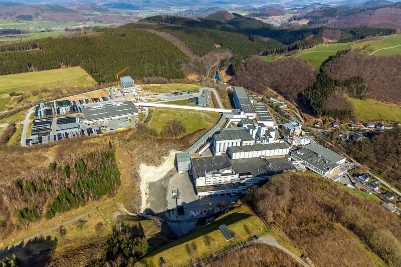Aerial view, Brewery C.& A. VELTINS GmbH & Co. KG, new high-bay warehouse, Grevenstein, Meschede, Sauerland, North Rhine-Westphalia, Germany, An der Streue, construction work, construction site, construction crane, construction measure, construction project, construction site, brewery, DE, Europe, beverage manufacturer, hilly landscape, capacity requirement, aerial view, aerial photography, aerial photography, new building, overview, Veltins, bird's eye view, forest area, meadows and fields, bird's eye view, overview