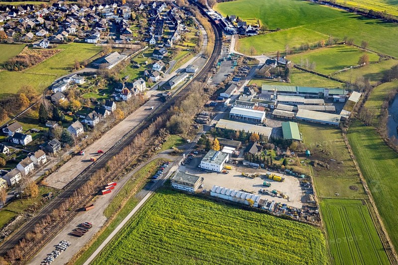 Aerial view, aerial view Wennemen, industrial area Im Ruhr Valley, railway station, goods station Wennemen, open space Südstraße, Meschede, Sauerland, North Rhine-Westphalia, Germany, railway tracks, DE, single-family houses, Europe, distant view, property tax, real estate, aerial view, aerial photography, aerial photography, overview, bird's-eye view, living and life, residential buildings, housing estate, birds-eyes view, overview