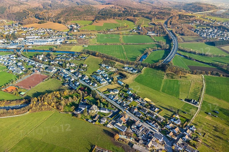 Aerial view, sports field and district Olpe, river Ruhr, motorway A46 with tunnel passage, local view, house Bethanien, Freienohler Straße, Olpe, Meschede, Sauerland, North Rhine-Westphalia, Germany, motorway bridge of the A46 crosses the river Ruhr, DE, single-family houses, Europe, Freienohler Straße crosses the river Ruhr, property tax, real estate, aerial view, aerial photography, aerial photography, Olpe district, tunnel passage, tunnel entrance of the motorway near Olpe, overview, bird's eye view, meadows and fields, living and life, residential buildings, residential quality, housing estate, birds-eyes view, overview
