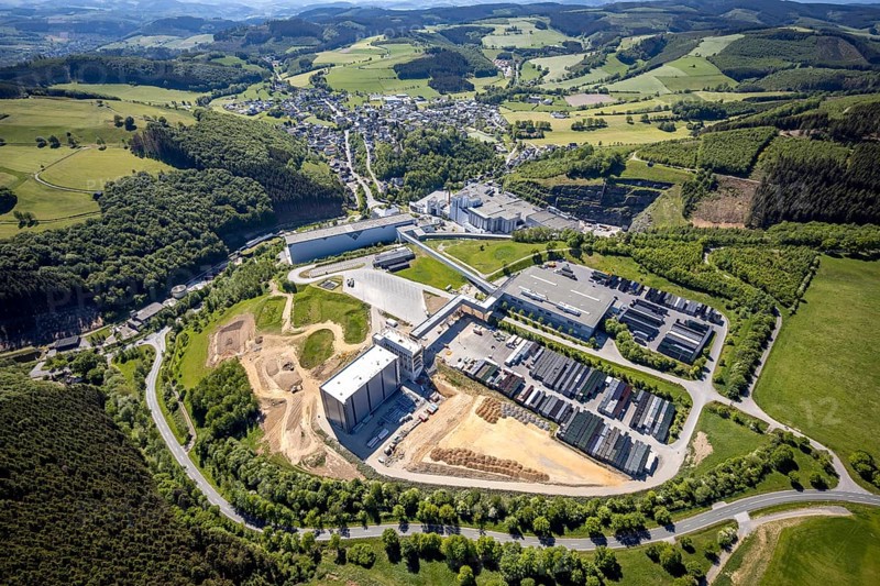 Aerial view, Brewery C.& A. VELTINS GmbH & Co. KG, new construction high-bay warehouse, Grevenstein, Meschede, Sauerland, North Rhine-Westphalia, Germany, An der Streue, construction work, construction site, construction crane, construction measure, construction project, construction site, brewery, DE, Europe, beverage manufacturer, Hochsauerlandkreis, hilly landscape, capacity requirement, aerial view, aerial photography, aerial photography, new construction, overview, Veltins, bird's-eye view, forest area, meadows and fields, birds-eyes view, overview