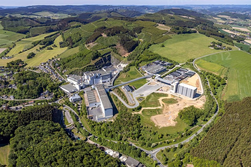Aerial view, Brewery C.& A. VELTINS GmbH & Co. KG, new construction high-bay warehouse, Grevenstein, Meschede, Sauerland, North Rhine-Westphalia, Germany, An der Streue, construction work, construction site, construction crane, construction measure, construction project, construction site, brewery, DE, Europe, beverage manufacturer, Hochsauerlandkreis, hilly landscape, capacity requirement, aerial view, aerial photography, aerial photography, new construction, overview, Veltins, bird's-eye view, forest area, meadows and fields, birds-eyes view, overview