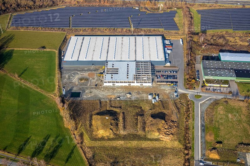 Aerial view, industrial estate Enste Nord, new construction logistics centre Briloner Leuchten, Meschede, Sauerland, North Rhine-Westphalia, Germany, expansion areas, motorway A46, construction work, construction area, building plots, construction measure, construction project, construction site, DE, Enster Straße, development, Europe, commercial area, commercial area, commercial use, industrial area, industrial site, capacity requirement, state road L743, aerial view, aerial photography, aerial photography, new construction, production plants, production halls, Stockhauser Straße, overview, bird's-eye view, bird's-eye view, overview