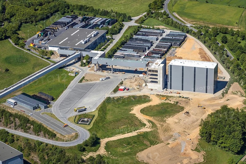 Aerial view, Brewery C.& A. VELTINS GmbH & Co. KG, new construction high-bay warehouse, Grevenstein, Meschede, Sauerland, North Rhine-Westphalia, Germany, An der Streue, construction work, construction site, construction crane, construction measure, construction project, construction site, brewery, DE, Europe, beverage manufacturer, Hochsauerlandkreis, hilly landscape, capacity requirement, aerial view, aerial photography, aerial photography, new construction, overview, Veltins, bird's-eye view, forest area, meadows and fields, birds-eyes view, overview
