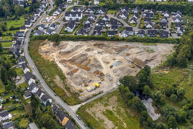 Aerial view, construction site construction area residential development Waldstraße, former concrete plant Alte Ziegelei II, Waldstraße, Meschede, Sauerland, North Rhine-Westphalia, Germany, construction work, construction vehicles, construction area, construction site, building plots, construction project, construction site, DE, development, Europe, property tax, Hochsauerlandkreis, real estate, capacity requirement, aerial view, aerial photography, aerial photography, overview, bird's-eye view, housing estate, living and living, residential area, residential buildings, residential quality, residential neighbourhood, housing estate, birds-eyes view, overview