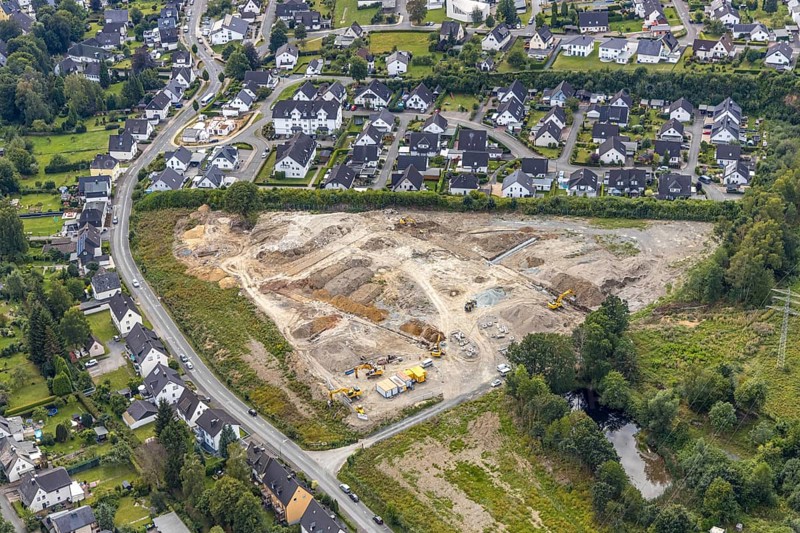 Aerial view, construction site construction area residential development Waldstraße, former concrete plant Alte Ziegelei II, Waldstraße, Meschede, Sauerland, North Rhine-Westphalia, Germany, construction work, construction vehicles, construction area, construction site, building plots, construction project, construction site, DE, development, Europe, property tax, Hochsauerlandkreis, real estate, capacity requirement, aerial view, aerial photography, aerial photography, overview, bird's-eye view, housing estate, living and living, residential area, residential buildings, residential quality, residential neighbourhood, housing estate, birds-eyes view, overview